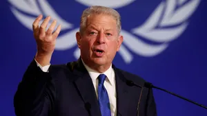 Al Gore Speaking At A News Conference Wallpaper