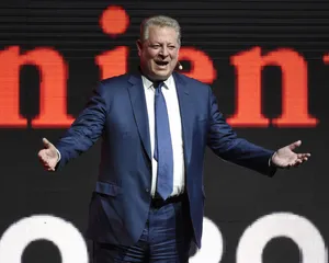 Al Gore Speaking On Stage Wallpaper