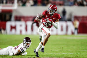 Alabama Football Player Evades Tackle Wallpaper