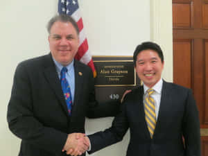 Alan Grayson Congratulates Chinese Guy Wallpaper