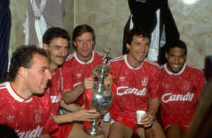 Alan Hansen With The League Championship Trophy 1990 Wallpaper