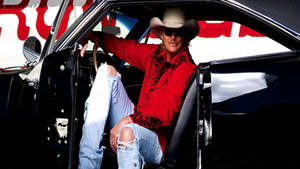 Alan Jackson Posing Inside Black Car Wallpaper