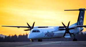 Alaska Airlines Aircraft With Propellers Wallpaper