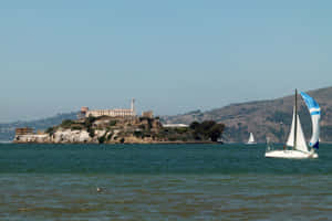 Alcatraz Islandwith Sailboat Wallpaper