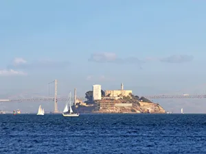Alcatraz Islandwith Sailboatsand Bay Bridge Wallpaper