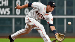 Alex Bregman Crouching Down To Catch Ball Wallpaper