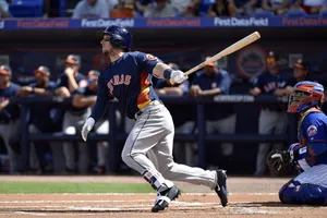 Alex Bregman Running While Holding Bat Wallpaper