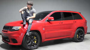 Alex Chino With Red Jeep Wallpaper