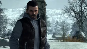 Alex Mason Posing For A Photoshoot By The Beach Wallpaper