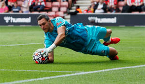 Alex Mccarthy Catches A Soccer Ball Wallpaper
