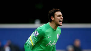 Alex Mccarthy Wearing A Green Jersey Wallpaper