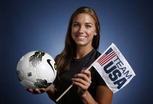 Alex Morgan With Team Usa Banner Wallpaper