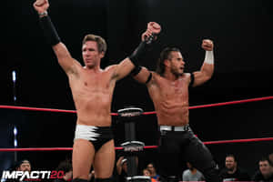 Alex Shelley And Chris Sabin In A Moment From Impact Wrestling Wallpaper