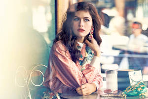 Alexandra Daddario In A Café Wallpaper