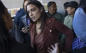 Alexandria Ocasio-cortez In A Leather Jacket Wallpaper
