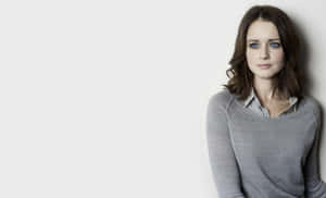 Alexis Bledel Striking A Charming Pose Wallpaper