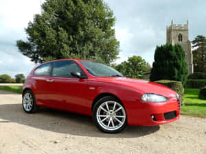 Alfa Romeo 147: A Blend Of Italian Design And Performance Wallpaper