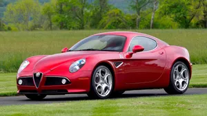Alfa Romeo 8c Competizione: A Captivating Italian Masterpiece Wallpaper