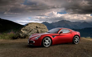 Alfa Romeo 8c Competizione Gliding On The Road Wallpaper