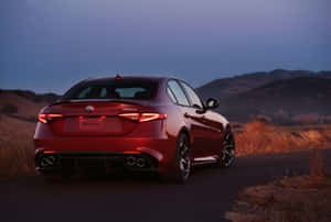 Alfa Romeo Giulia - 2018 Model In Elegant Red Wallpaper