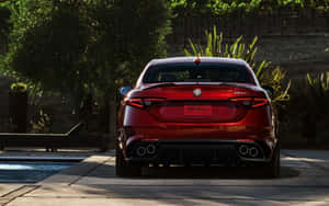 Alfa Romeo Giulia On A Scenic Road Wallpaper