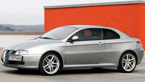 Alfa Romeo Gt - A Symbol Of Italian Performance And Style Wallpaper