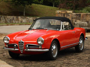 Alfa Romeo Spider - A Perfect Blend Of Style And Performance On The Road. Wallpaper