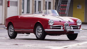 Alfa Romeo Spider Convertible In Vibrant Red Wallpaper