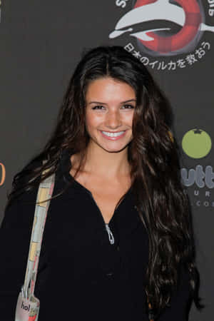 Alice Greczyn Posing Elegantly In A Photoshoot Wallpaper