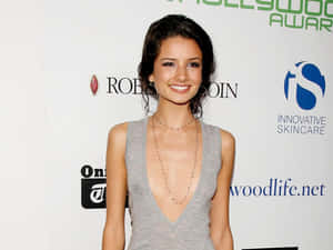 Alice Greczyn Smiling Elegantly Wallpaper