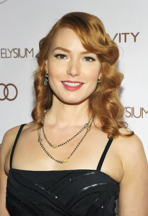 Alicia Witt - Radiant In Red Wallpaper