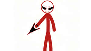 Alien Holding Gun Wallpaper