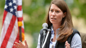 Alison Lundergan Grimes Beside Flag Wallpaper