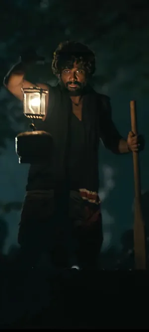 Allu Arjun Hd Holding Lamp Wallpaper