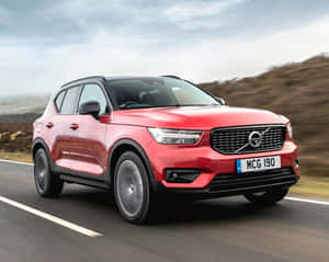 Alluring Elegance - The Volvo Xc40 On An Open Road Wallpaper