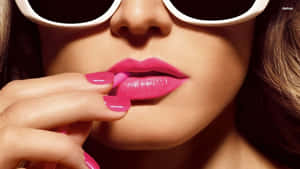 Alluring Pink Lipstick On Luxurious Lips Wallpaper