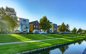 Almere Modern Housing Canal View Wallpaper