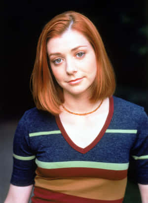 Alyson Hannigan Posing For A Glamorous Photoshoot Wallpaper