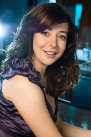 Alyson Hannigan Posing For A Photoshoot Wallpaper