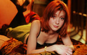 Alyson Hannigan Posing For A Portrait Wallpaper