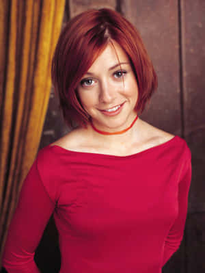 Alyson Hannigan Posing For A Portrait Wallpaper