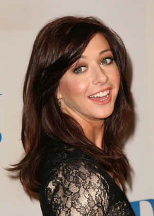 Alyson Hannigan Smiling Radiantly At The Camera Wallpaper