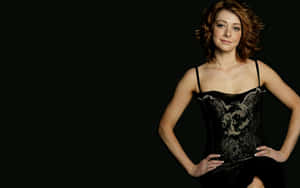 Alyson Hannigan Smiling Radiantly Wallpaper