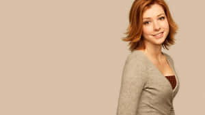 Alyson Hannigan Striking A Pose Wallpaper