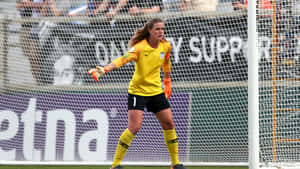 Alyssa Naeher In Action During A Soccer Match Wallpaper