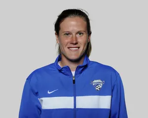 Alyssa Naeher In Action On Field Wallpaper