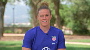 Alyssa Naeher In Action On The Soccer Field Wallpaper