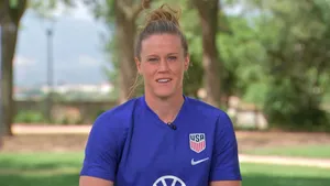 Alyssa Naeher In Action On The Soccer Field Wallpaper