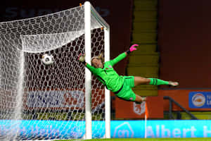 Alyssa Naeher In Action On The Soccer Field Wallpaper