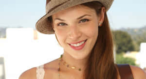 Amanda Righetti Smiling With Hat Wallpaper